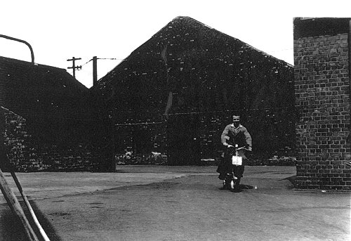 Dennis Moody rides one of the Elswick-Hopper mopeds at Hopper's factory