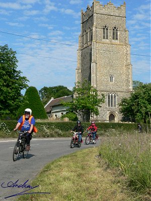 Riding past Horham church