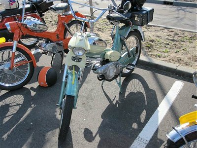A pair of Puch mopeds