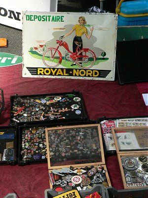 Badges and a Royal Nord sign