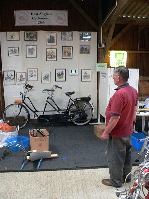 David admires the gallery ... or the tandem ... or both