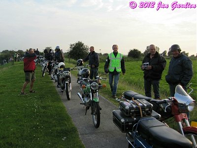 A pause while the riders cross the railway