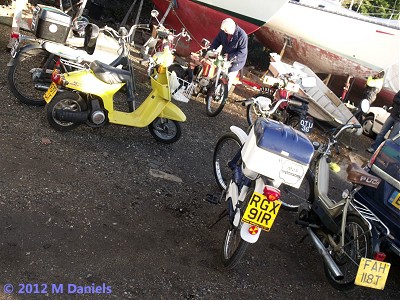 Assorted mopeds at Orwell Yacht Club