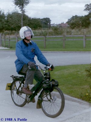 David Butler finishes the ride on his VéloSoleX