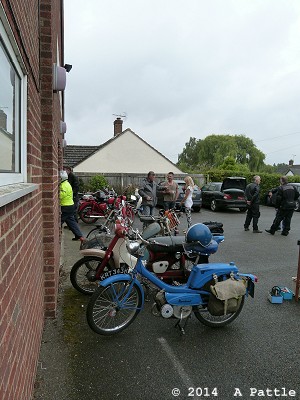 Bikes in the rain outside the hall