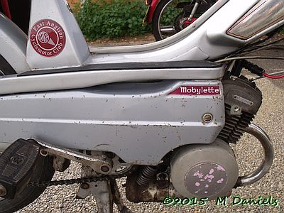 EACC badge on a Mobylette