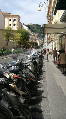 A long line of mopeds