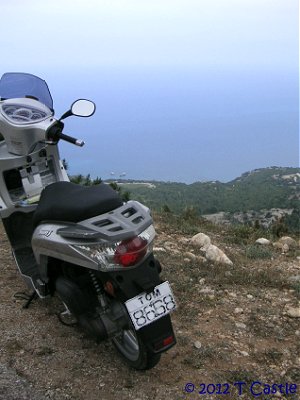 Tom's hired Kymco People S had an appropiate number plate