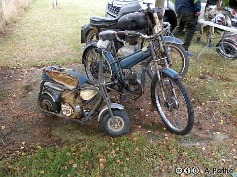 An American Mini Bike and a French moped—the moped has a Mistral engine