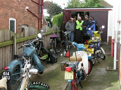 Hopefully, the cup is for tea and the fuel for the bikes