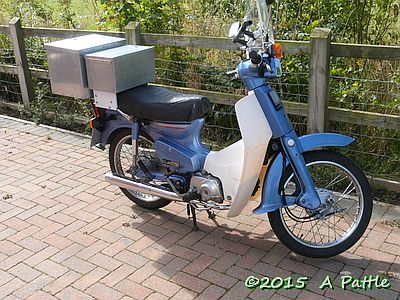 Blue moped: Honda Cub