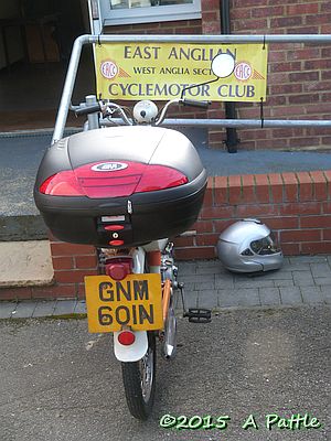 Top box with a moped attached